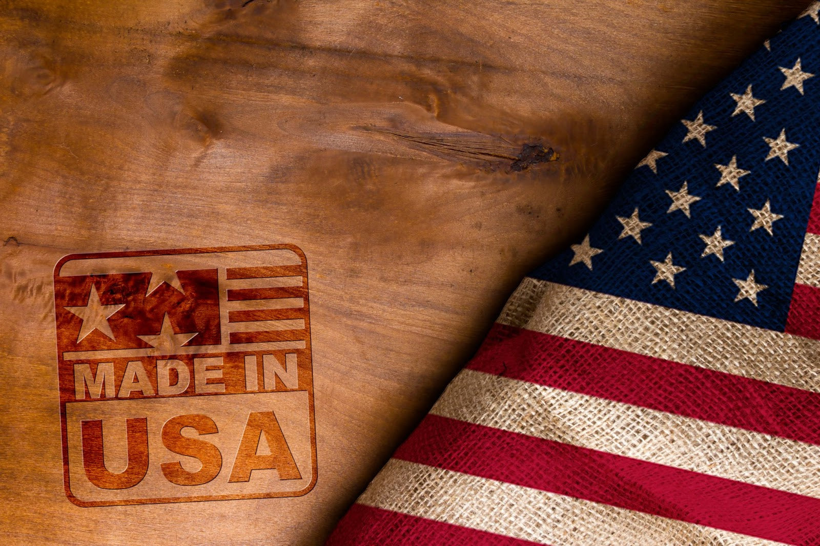 Image of a wooden surface with a Made in USA stamp and an American flag.