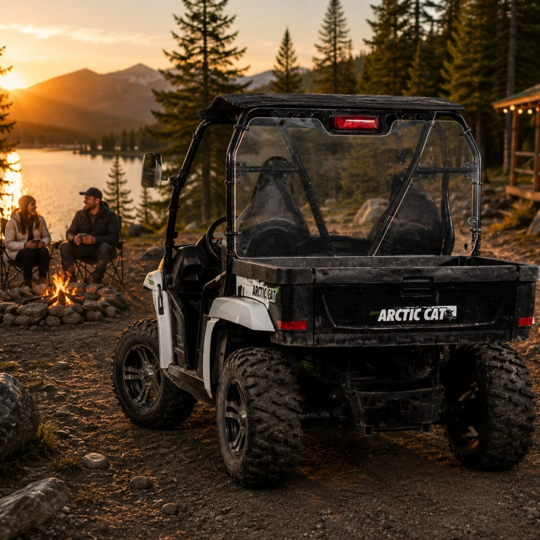 Rear view of a 2011-2014 Arctic Cat Prowler with a TerraRider rear windshield, parked by a lake