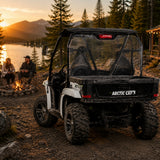Rear view of a 2011-2014 Arctic Cat Prowler with a TerraRider rear windshield, parked by a lake