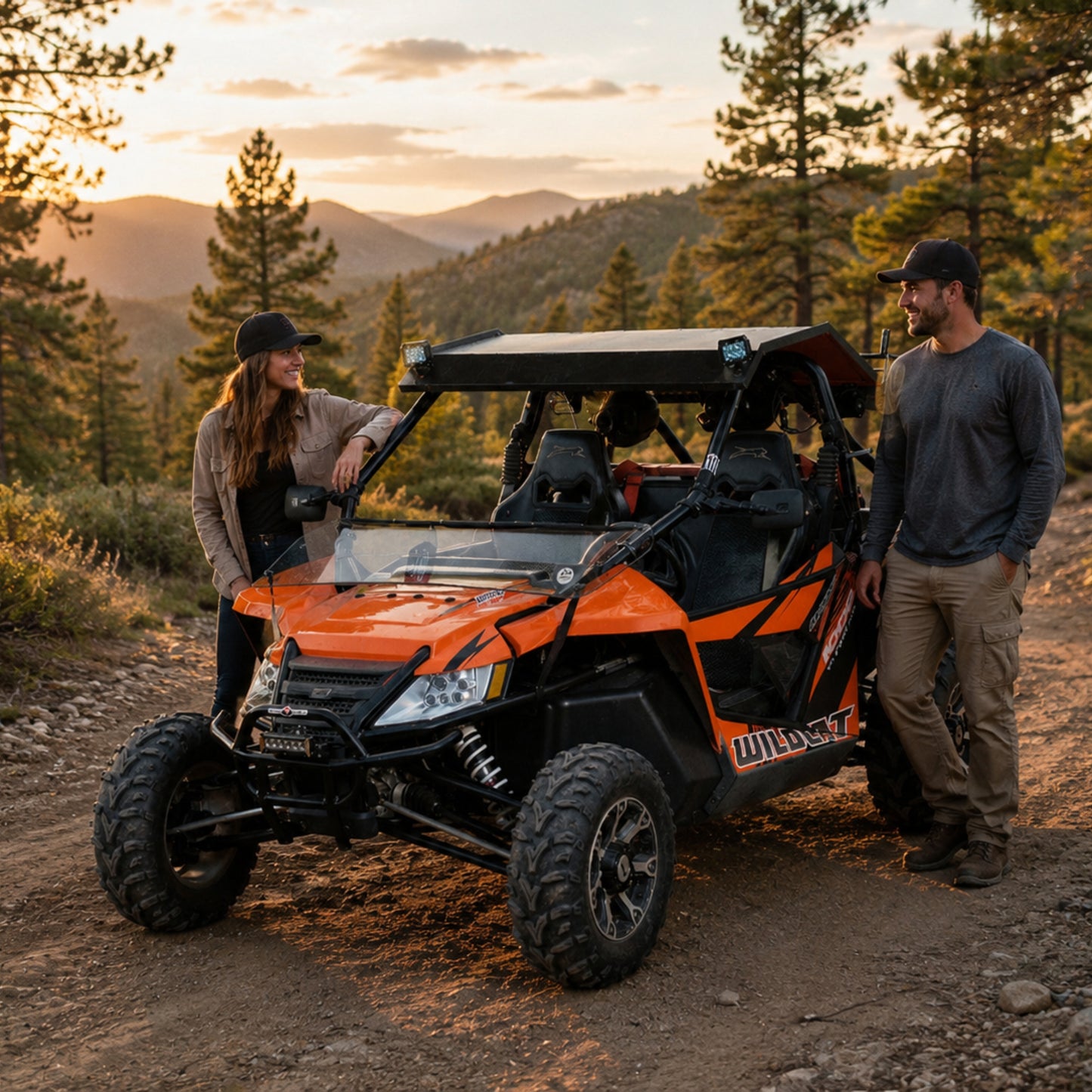 2012-2018 Arctic Cat Wildcat with a TerraRider tilting windshield and hard top, parked outdoors with riders