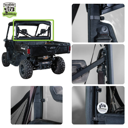Close-up views of the Defender rear windshield mounted behind the side-by-side cab and cargo bed